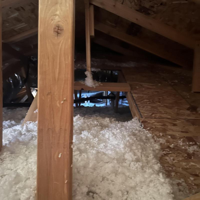 Attic fiberglass insulation installation and floor access Attic fiberglass insulation installation and floor access