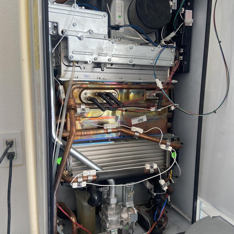 Tankless water heater internal components and wiring Tankless water heater internal components and wiring