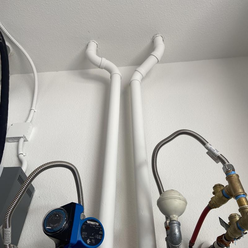 Tankless water heater vent pipes and plumbing connections Tankless water heater vent pipes and plumbing connections