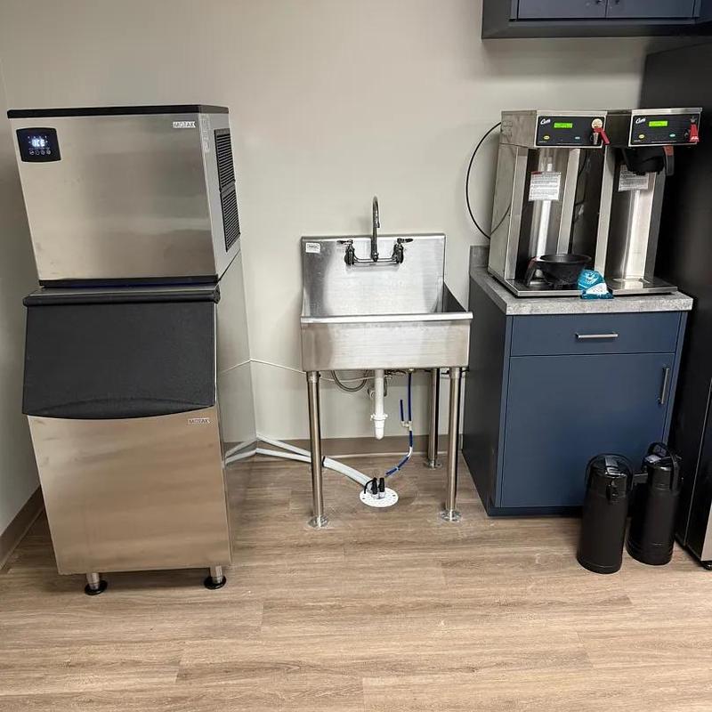 Commercial utility sink with ice maker and coffee machines Commercial utility sink with ice maker and coffee machines
