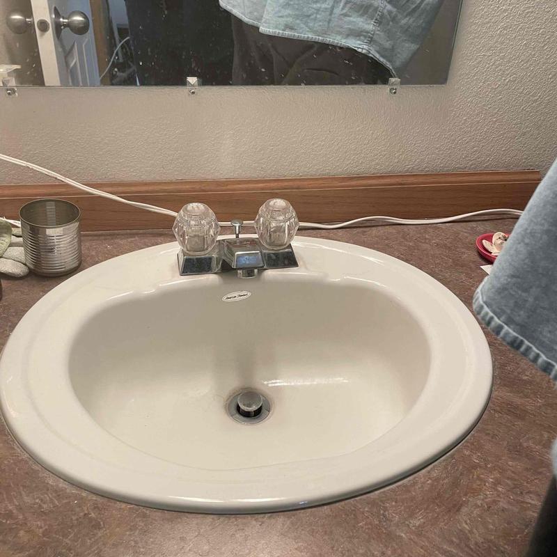 Bathroom lavatory faucet installation on countertop sink
