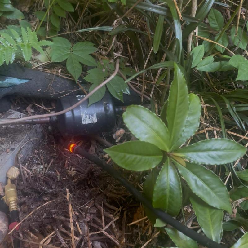Filter dryer leak detection with nitrogen torch in bushes