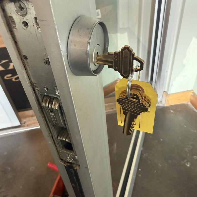 Door cylinder lock with new keys at ice cream store Door cylinder lock with new keys at ice cream store