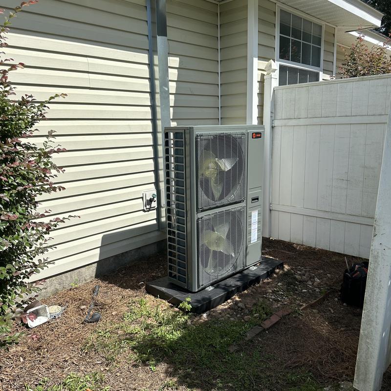 Side discharge 5 ton HVAC unit installed outdoors