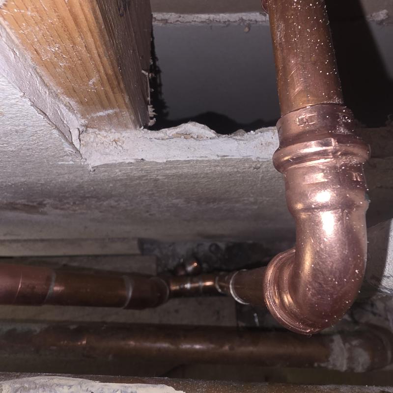 Copper hot water pipe reroute above slab ceiling Copper hot water pipe reroute above slab ceiling
