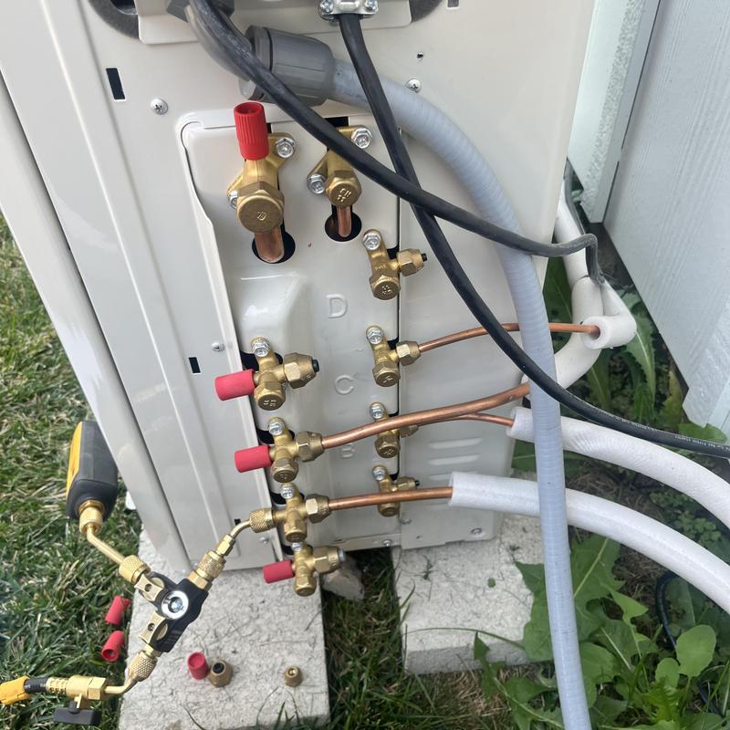 Heat pump refrigerant lines with service gauges attached Heat pump refrigerant lines with service gauges attached