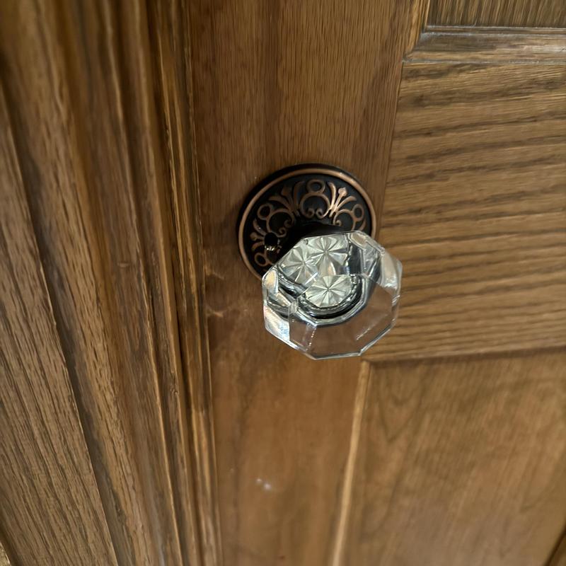 Glass bathroom door knob with antique lock mechanism Glass bathroom door knob with antique lock mechanism