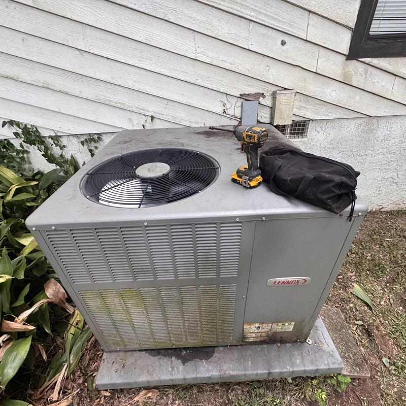 Heat pump package unit with drill and tool bag