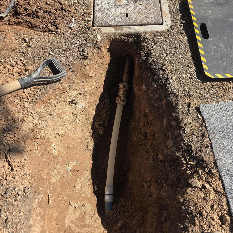 Pex water service line section in ground excavation