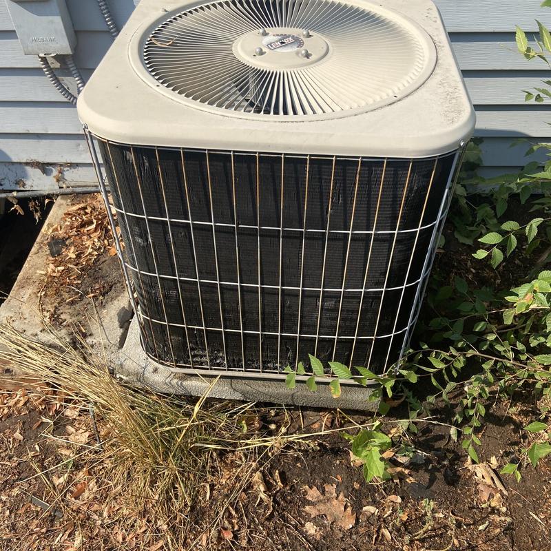 Condenser unit with dirty coils and exterior buildup Condenser unit with dirty coils and exterior buildup