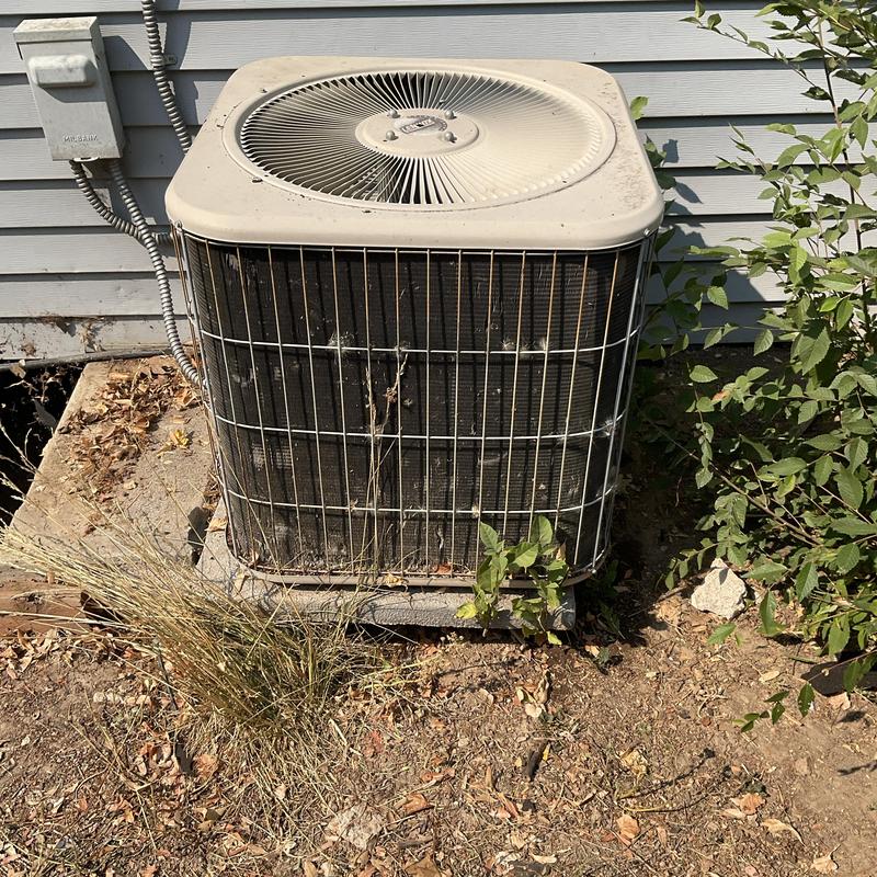 Air conditioner condenser unit with dirty coil and debris Air conditioner condenser unit with dirty coil and debris