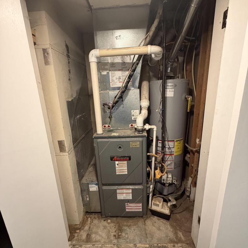Closet furnace and water heater in small utility space Closet furnace and water heater in small utility space