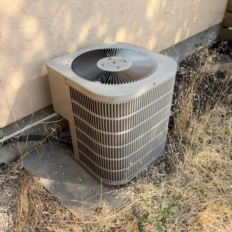 Central air conditioner unit outside home Central air conditioner unit outside home