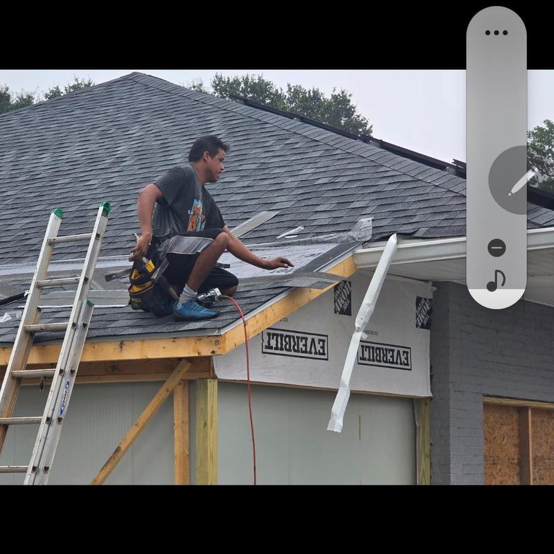 Iko shingle roofing installation on house extension