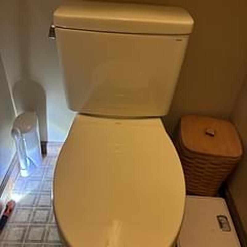 Toto Drake ADA elongated toilet installed in bathroom