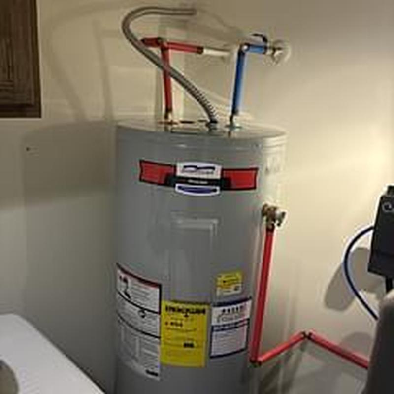 Electric tall water heater with plumbing connections Electric tall water heater with plumbing connections