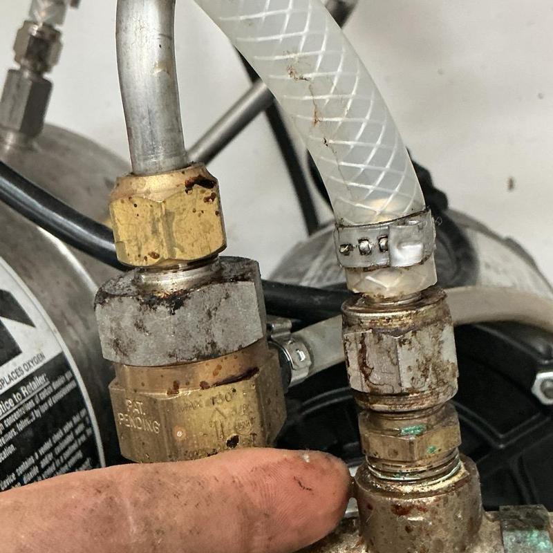 Water fountain pump hose and fittings with rust buildup Water fountain pump hose and fittings with rust buildup