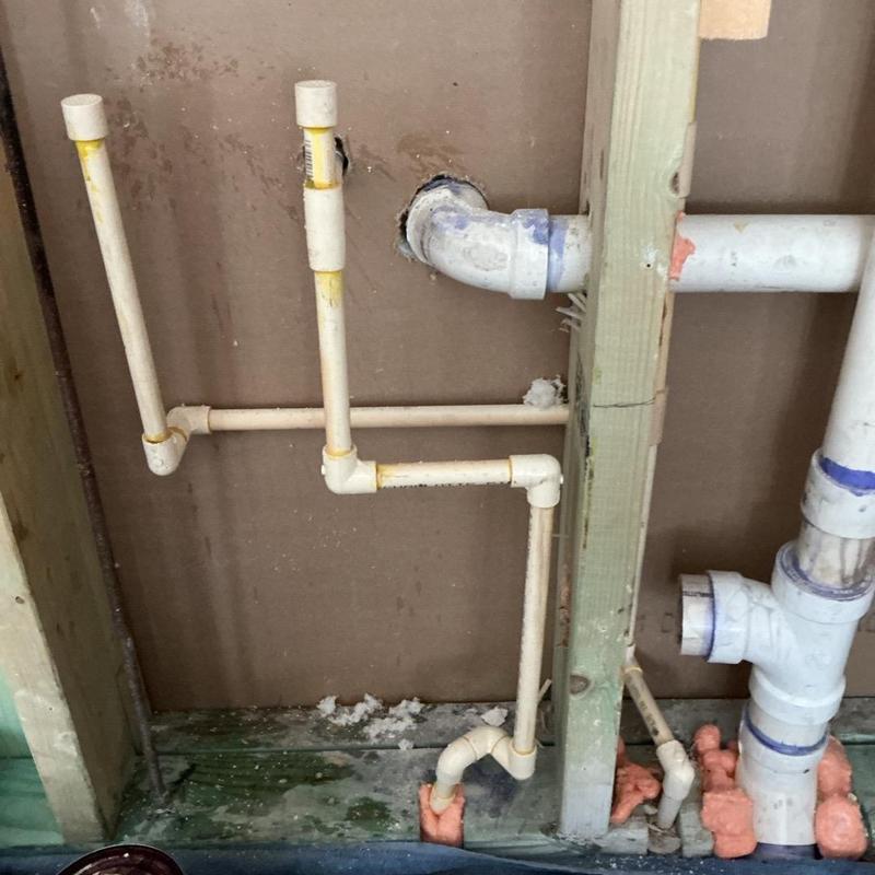 Hand sink waste arm roughed-in with water lines moved Hand sink waste arm roughed-in with water lines moved