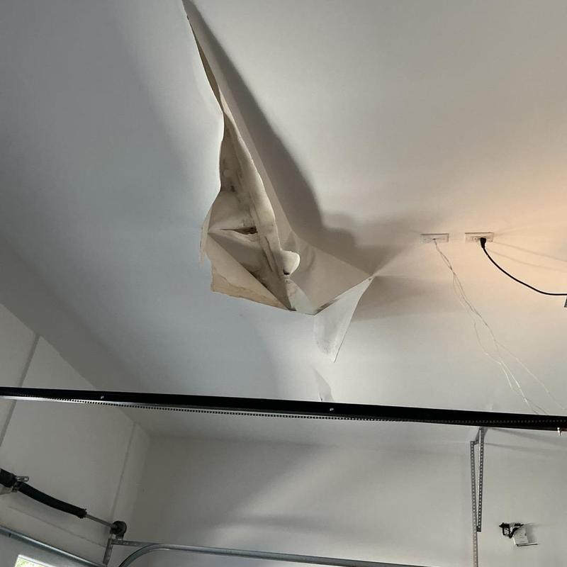 Ceiling drywall damage with water stains and sagging Ceiling drywall damage with water stains and sagging