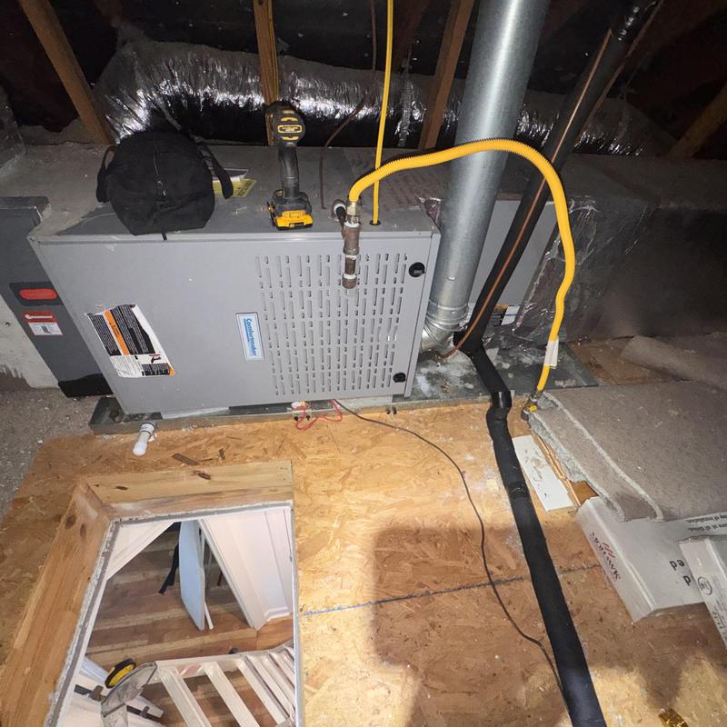 Furnace split system with yellow gas line and vent pipe