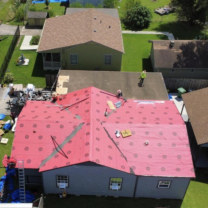 Roof underlayment installation on residential home