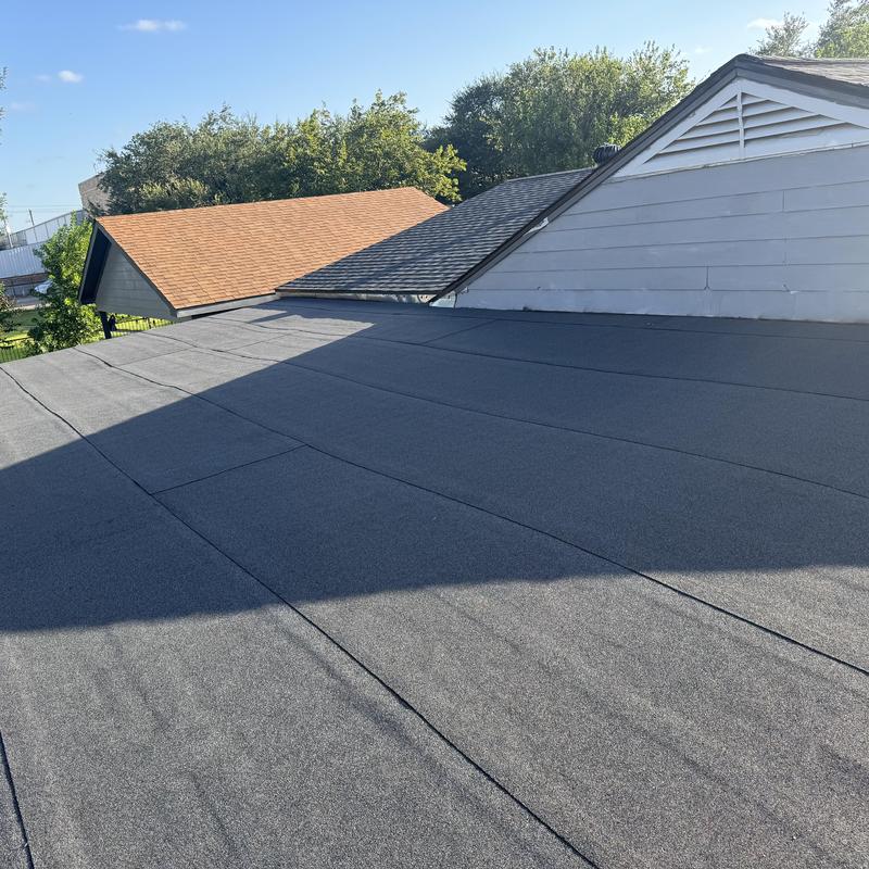Low-slope roofing system with new membrane installation