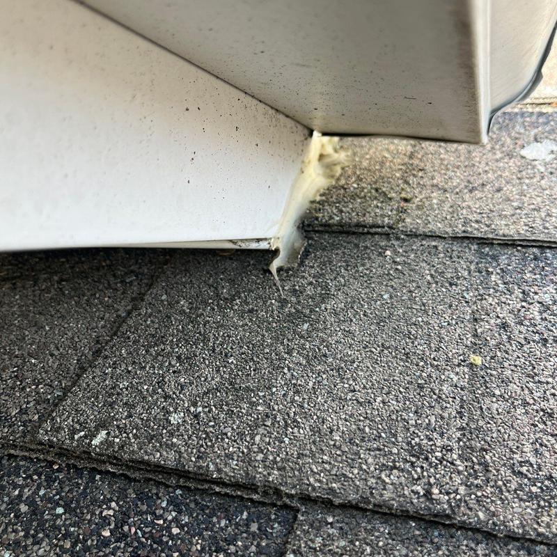 Roof shingles with damaged roof penetration sealant