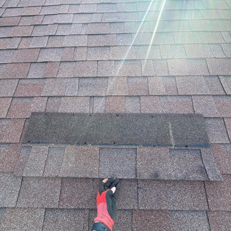 Asphalt roof shingles with hail damage inspection