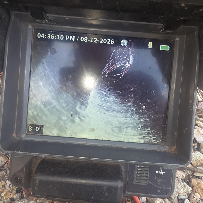 Main sewer line camera showing root intrusion blockage