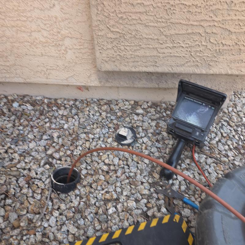 Main sewer line inspection with camera and snake tool