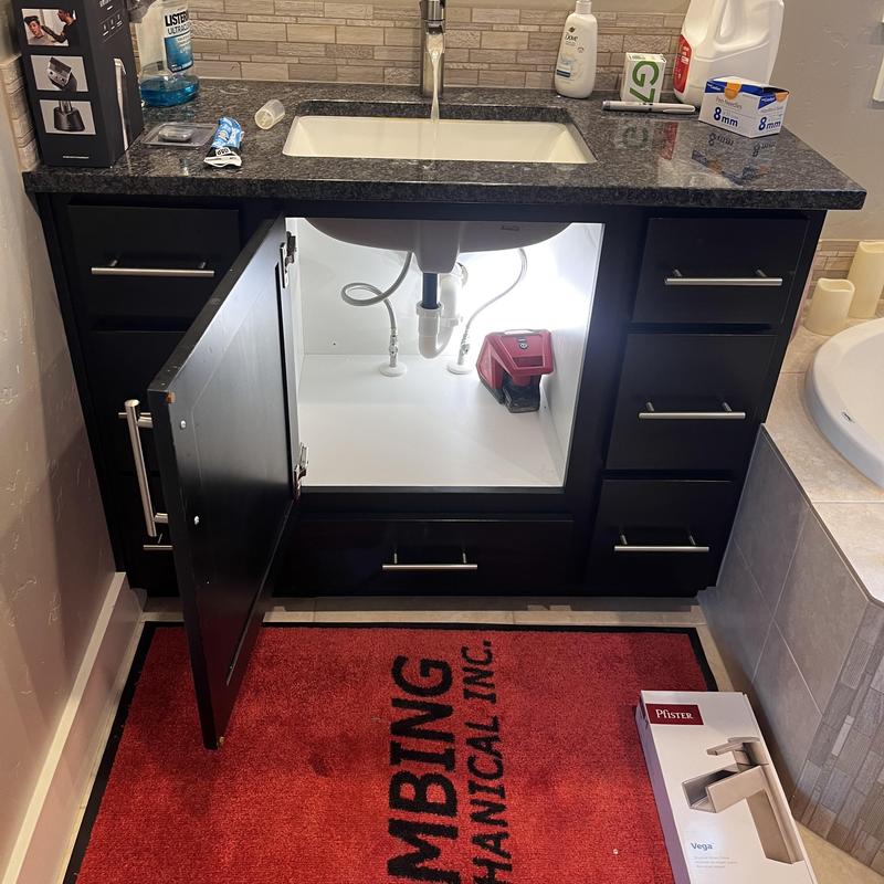 Single handle faucet and garbage disposal installation under sink