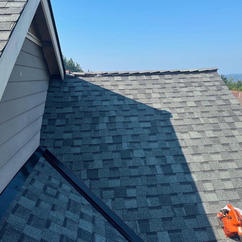 Premium shingle roof with valley flashing installation