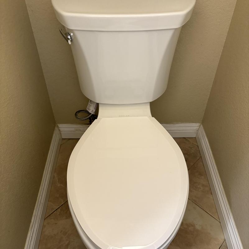 Elongated comfort height toilet with new supply line