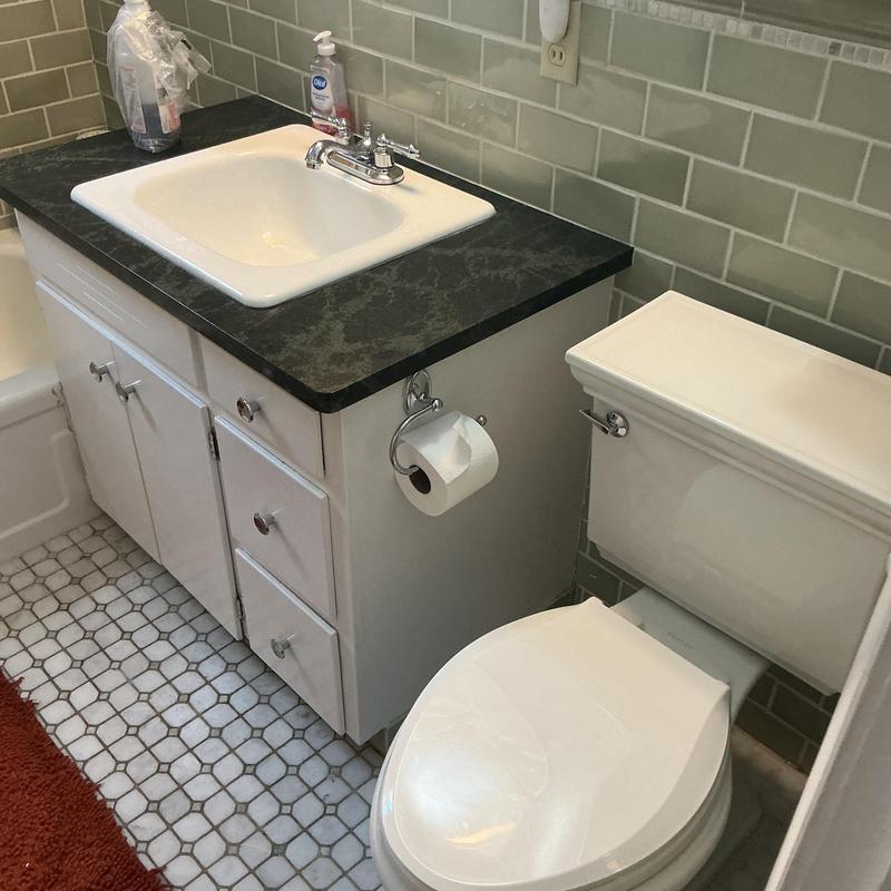Kohler comfort height elongated toilet and sink faucet Kohler comfort height elongated toilet and sink faucet