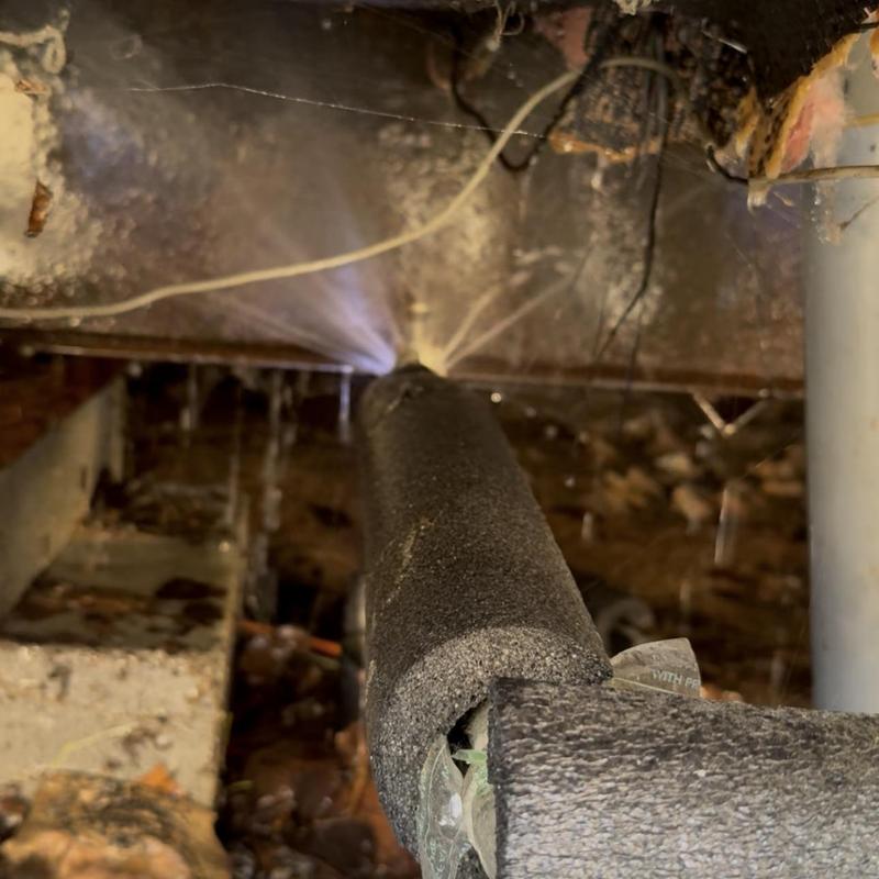 Galvanized pipe leak spraying water in crawl space Galvanized pipe leak spraying water in crawl space