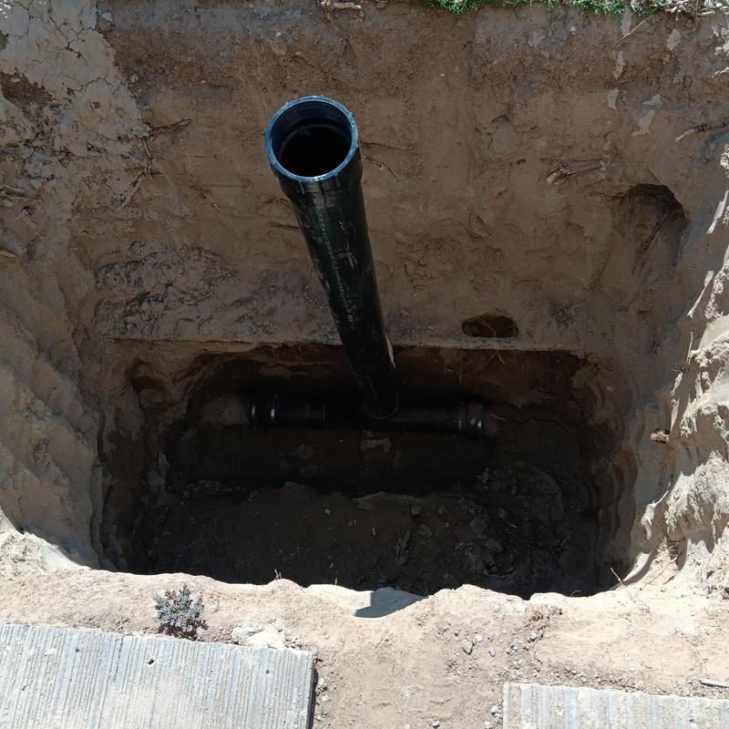 Trenchless polyethylene sewer pipe installation in dirt pit Trenchless polyethylene sewer pipe installation in dirt pit