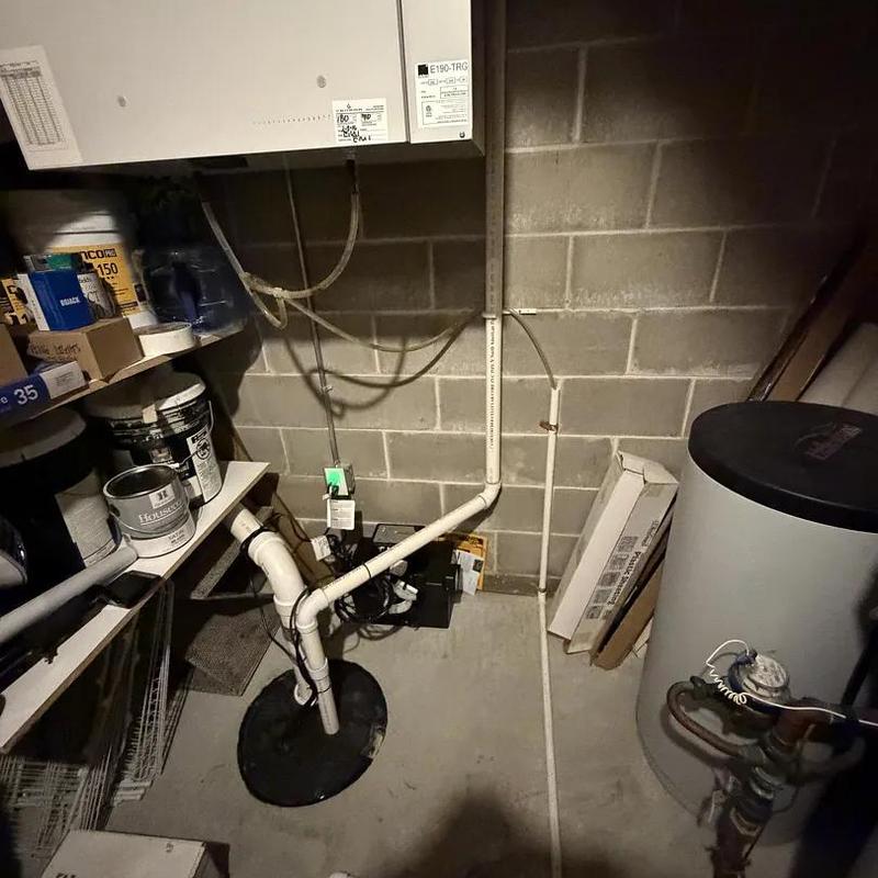 Sump pump with battery backup installation in basement Sump pump with battery backup installation in basement