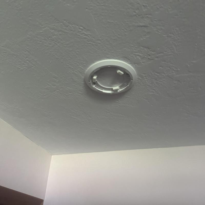Smoke detector base installed on ceiling in Boise home Smoke detector base installed on ceiling in Boise home