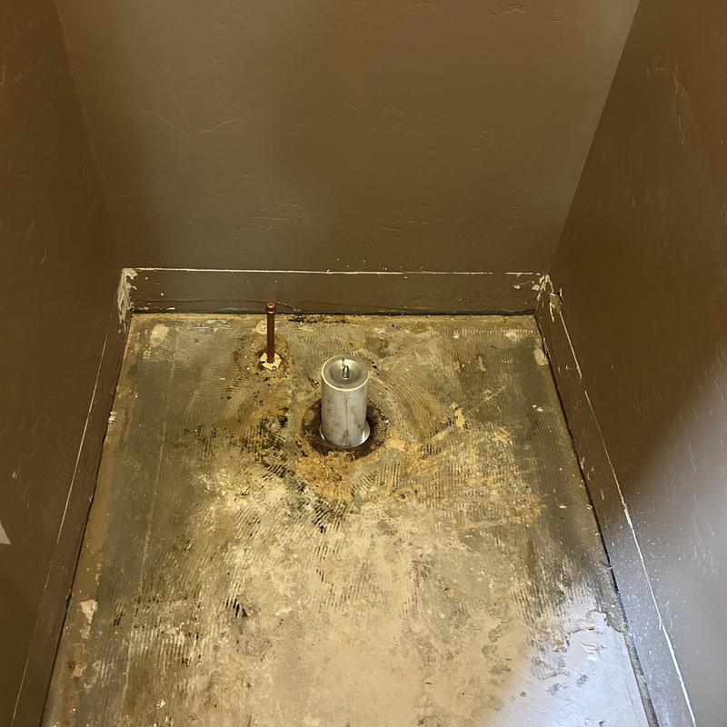 Toilet flange and pipe installation in bathroom floor Toilet flange and pipe installation in bathroom floor