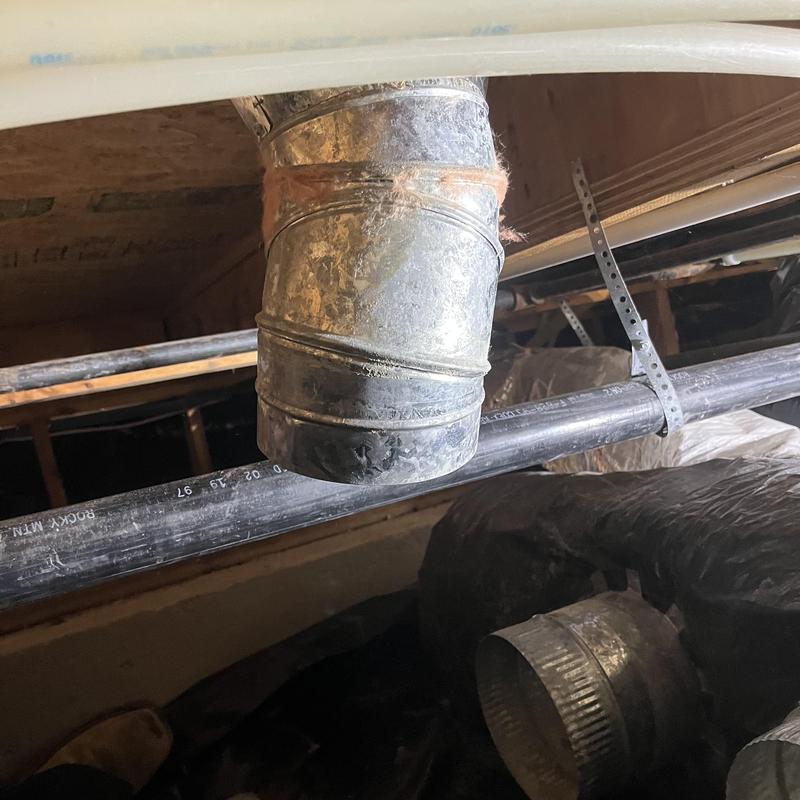 Metal duct elbow connection in attic space Metal duct elbow connection in attic space