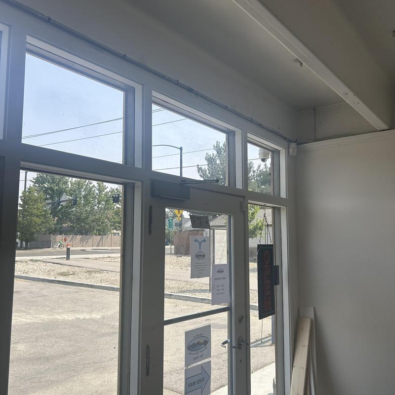 Commercial lighting installation near entrance door Commercial lighting installation near entrance door