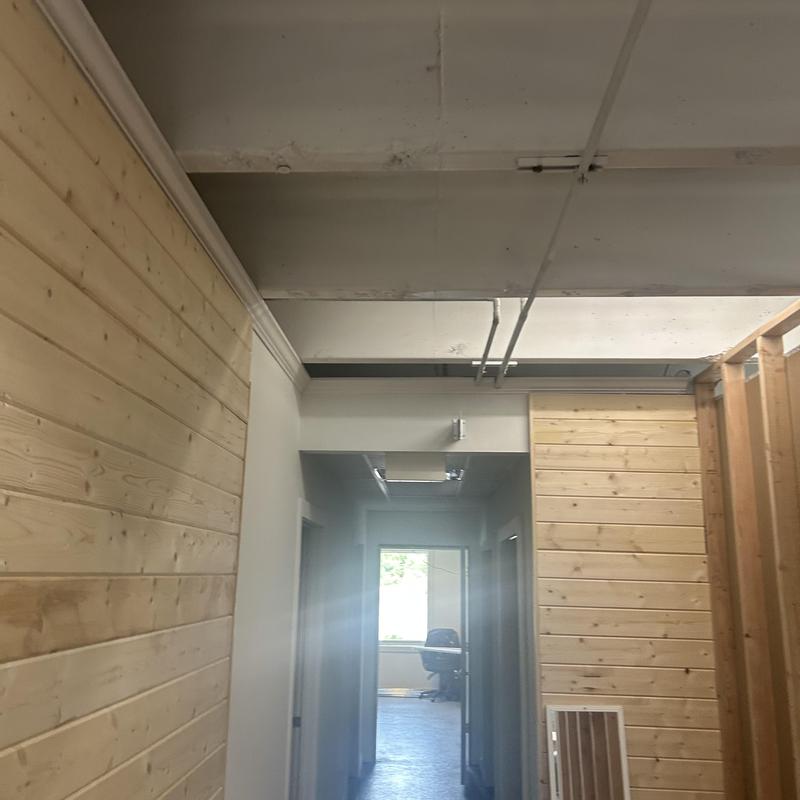 Commercial LED light fixtures installation in hallway Commercial LED light fixtures installation in hallway