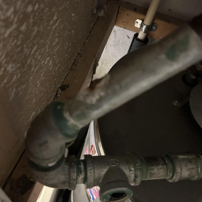 Water heater pipe with repaired leak fitting Water heater pipe with repaired leak fitting