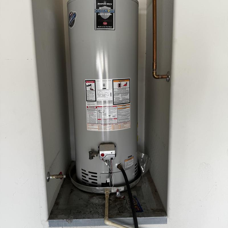 Bradford White water heater installed in utility space