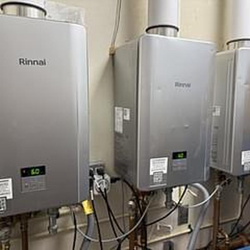 Water heater fan blower assembly installation in utility room