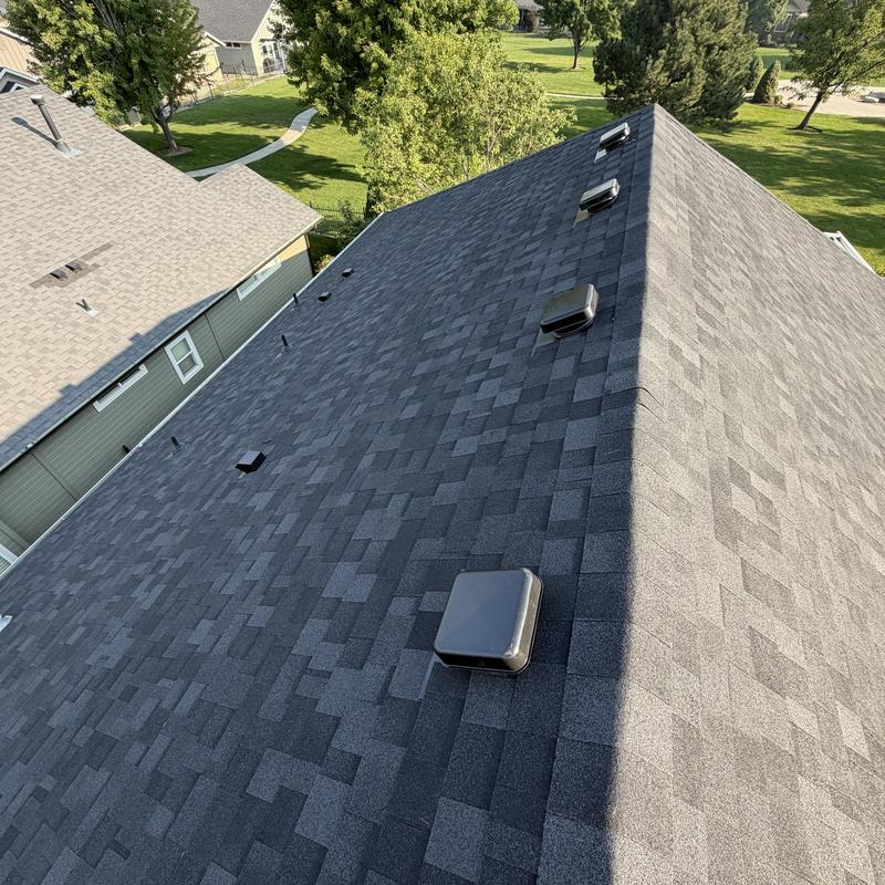 IKO Dynasty shingle roof with vent caps installed IKO Dynasty shingle roof with vent caps installed