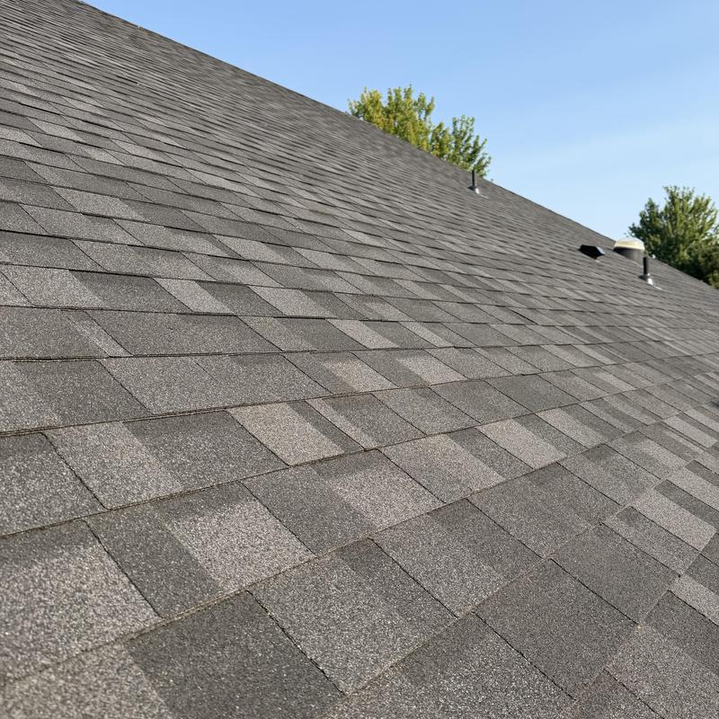 IKO Dynasty asphalt roof shingles on residential roof IKO Dynasty asphalt roof shingles on residential roof