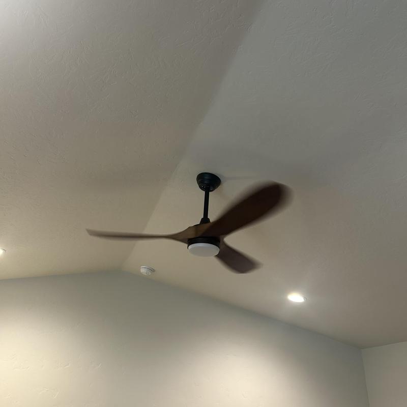 Ceiling fan installation with light fixture in room ceiling Ceiling fan installation with light fixture in room ceiling