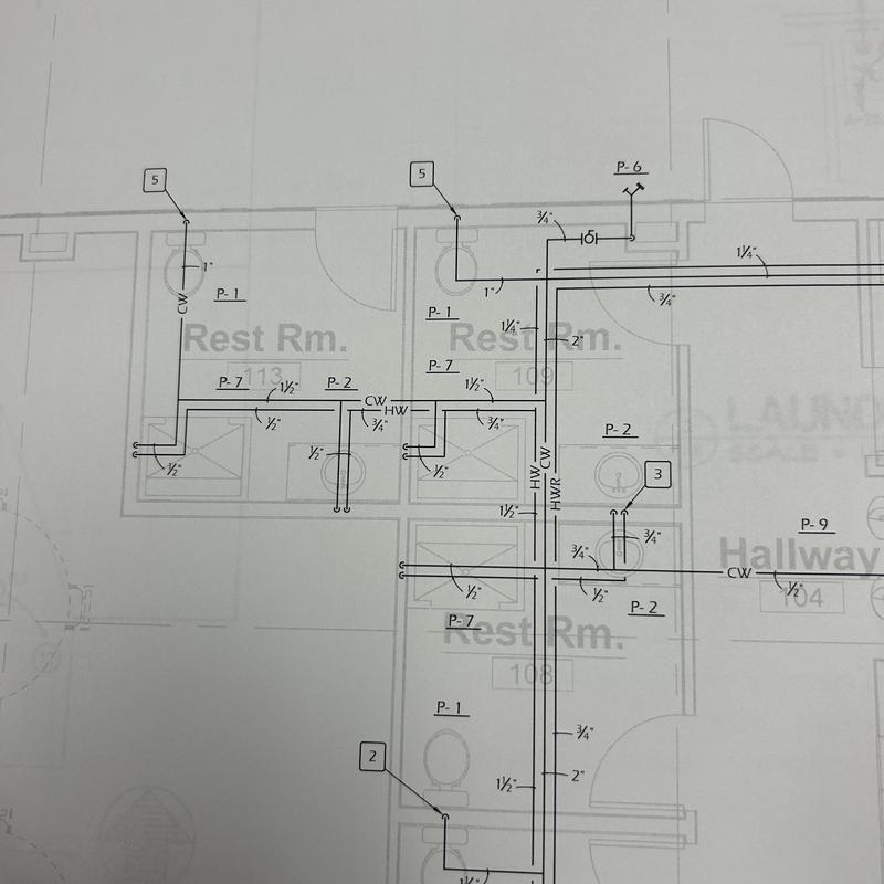Commercial bathroom plumbing layout for restroom conversion Commercial bathroom plumbing layout for restroom conversion