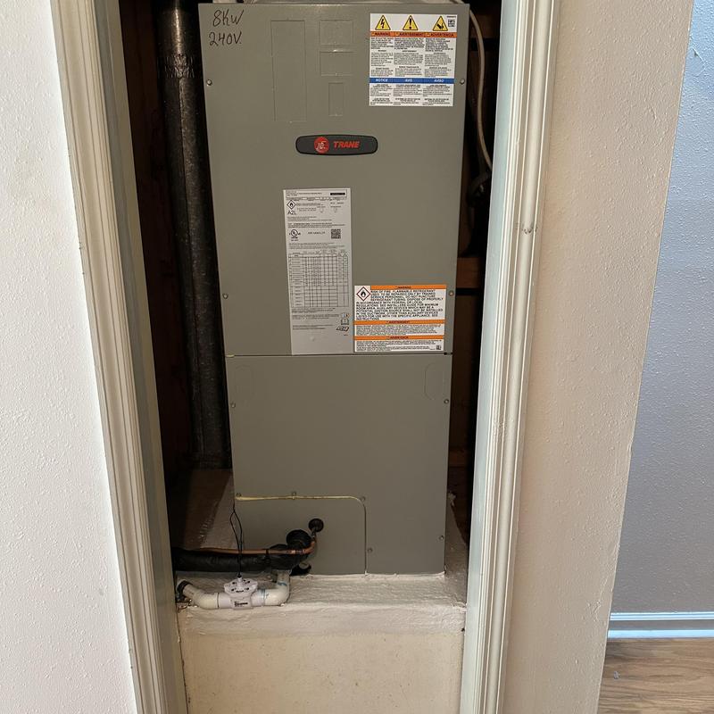 Trane air handler unit installed in rental property closet Trane air handler unit installed in rental property closet